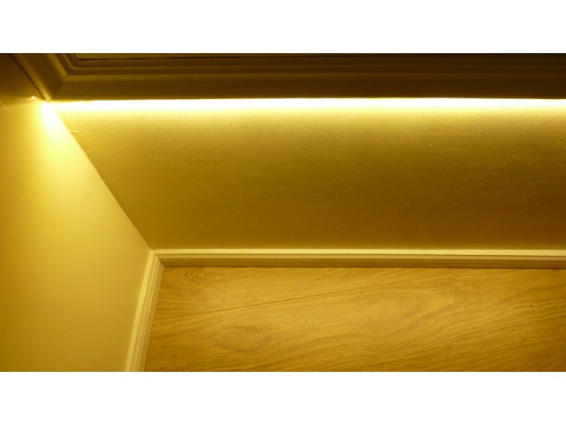 Edge Lit Strip installed under a cabinet to provide a bright linear glow