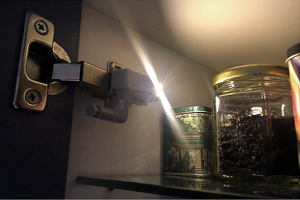 Kitchen Cabinet illuminated with hinge light